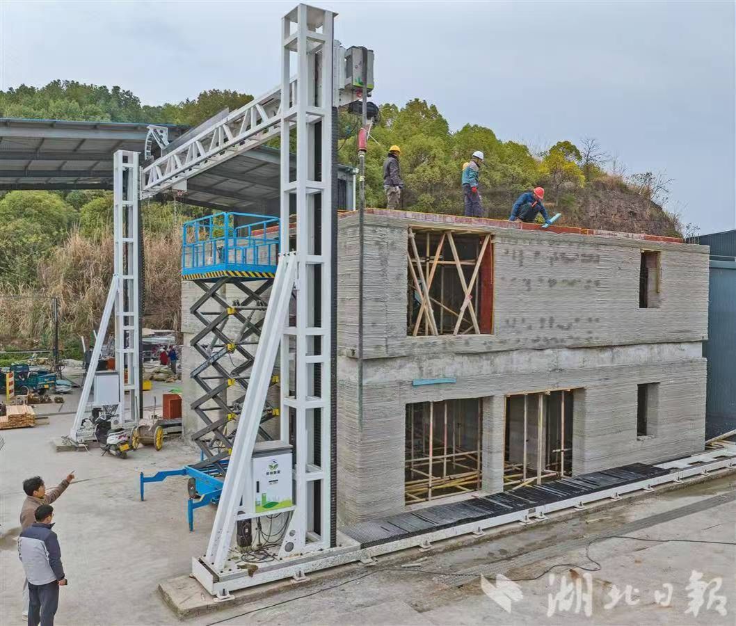 【湖北日报】美加墨世界杯官方网站“打印”出双层小楼-1027-媒体关注